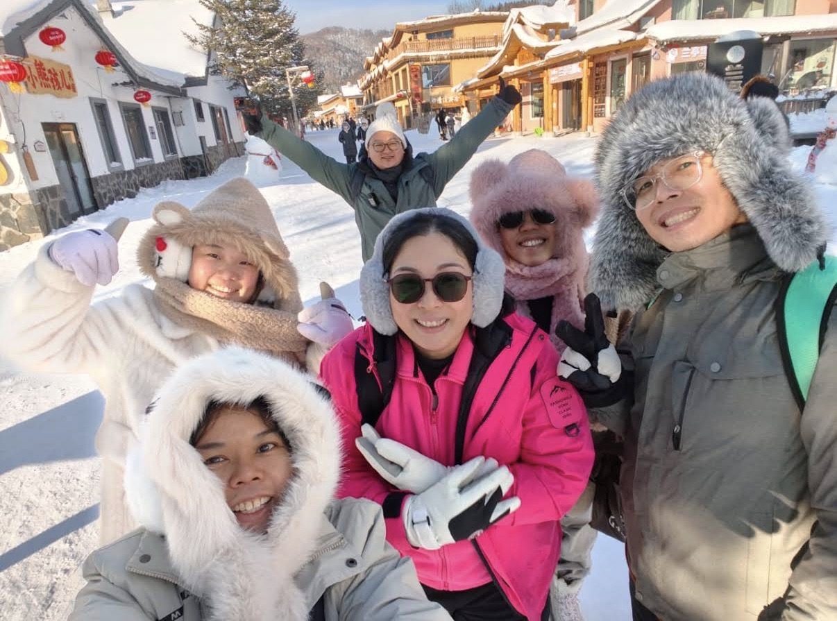 Our group on the snowy main street of China Snow Town