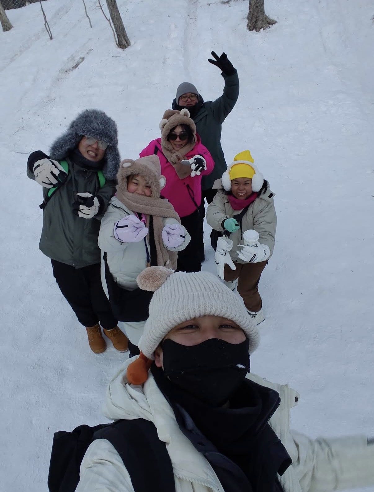 Our group dressed for the cold on a snowy slope